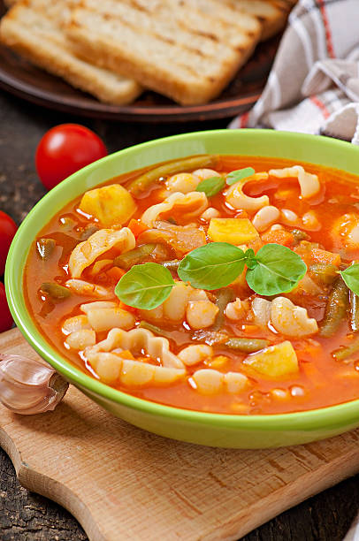 istock Minestrone, italian vegetable soup with pasta 477521729