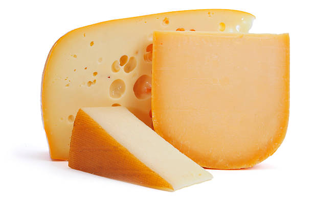 european cheese assortment closeup of some pieces of cheese, such as Gouda or Leerdammer gouda cheese stock pictures, royalty-free photos & images