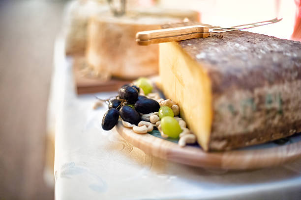 close-up of Various types of cheese as appetiser at vintage close-up of Various types of cheese at vintage party appetiser stock pictures, royalty-free photos & images