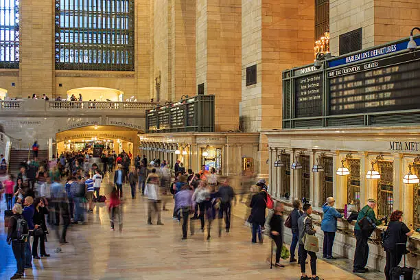 Grand central station with daparture board with people during rush hour