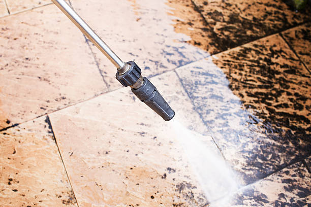 istock outdoor floor cleaning with high pressure water 477525672