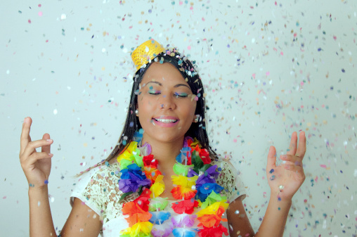 dressed in woman dancing with carnival confetti