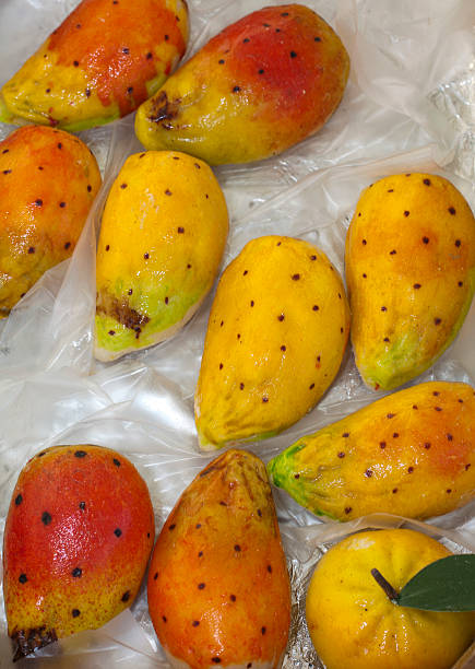 sweet fruit-shaped marzipan or almond paste sweet fruit-shaped marzipan or almond paste, apples and prickly pears fico d'india stock pictures, royalty-free photos & images
