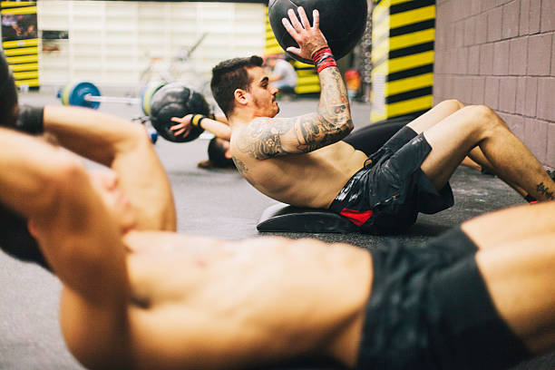 istock Young men in high intensity fitness session. 477529978