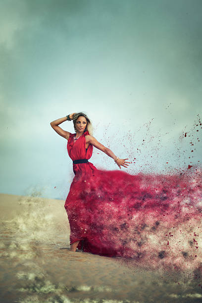 istock Woman dissapearing in the desert 477530154