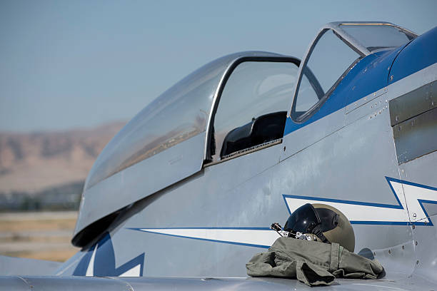 istock Vintage fighter pilot's helmet and cockpit. 477530186