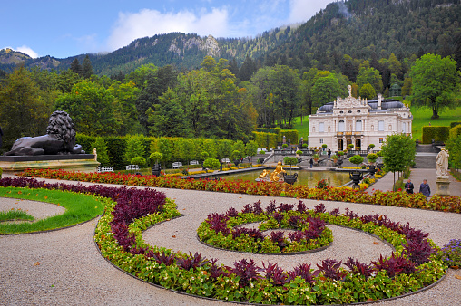 Bayern, Germany - September 13, 2014: Garden of Schloss Linderhof, Bayern, Germany Linderhof Palace (German: Schloss Linderhof) is a Schloss in Germany, in southwest Bavaria near Ettal Abbey. It is the smallest of the three palaces built by King Ludwig II of Bavaria and the only one which he lived to see completed.