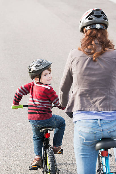 istock Little boy riding bike 477534227