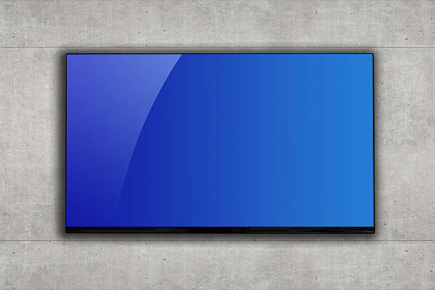 tv lcd montado em branco em uma parede de cimento - blue plasma imagens e fotografias de stock