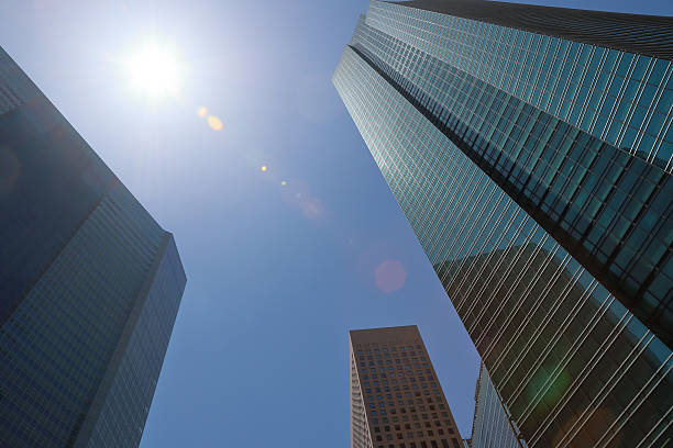 istock high-rise building and the sun 477535128