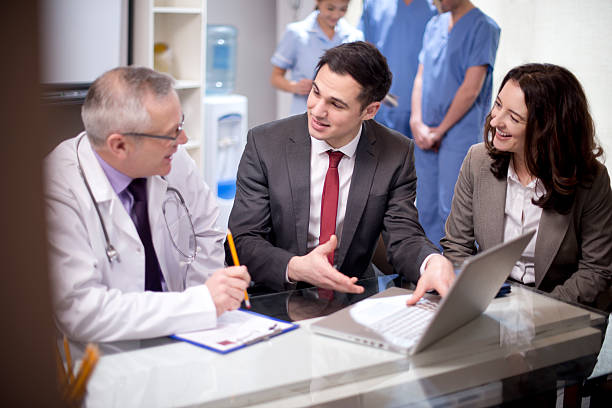 vendite sanitari - healthcare and medicine smiling group of people lab coat foto e immagini stock