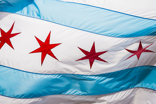 A Chicago state flag waving in the wind.