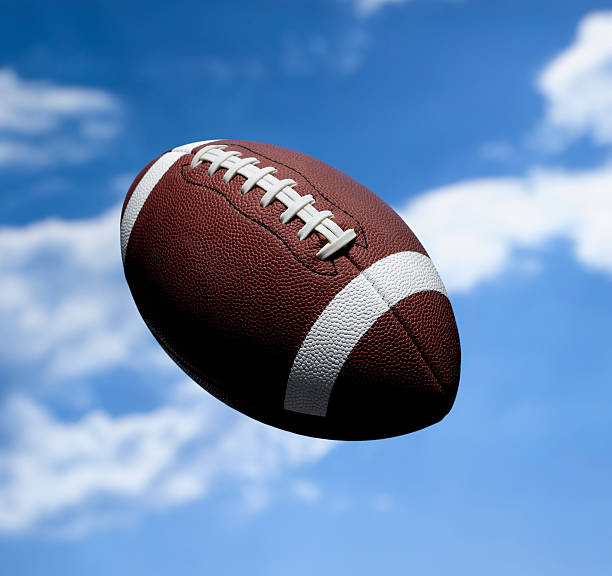 istock Flying American Football 477538815
