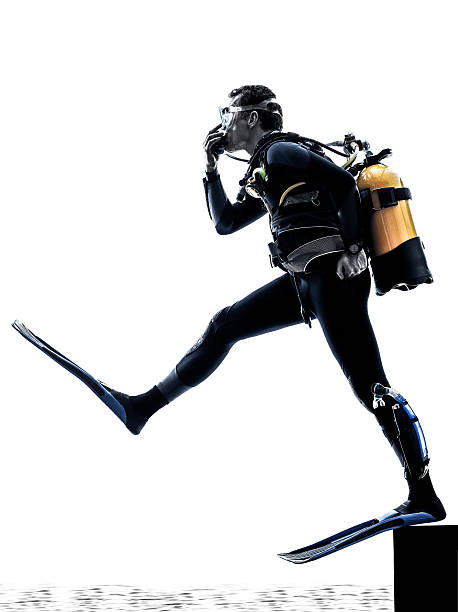 istock man scuba diver diving silhouette isolated 477538918