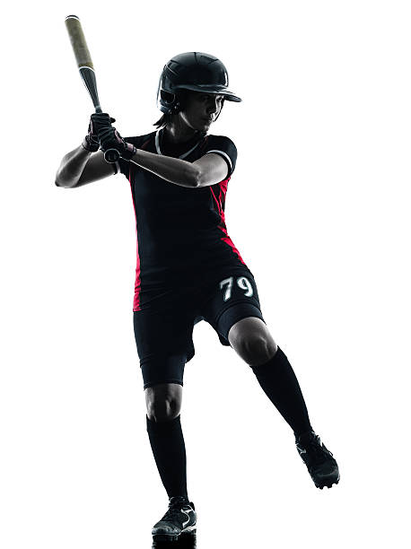 istock woman playing softball players silhouette isolated 477539000