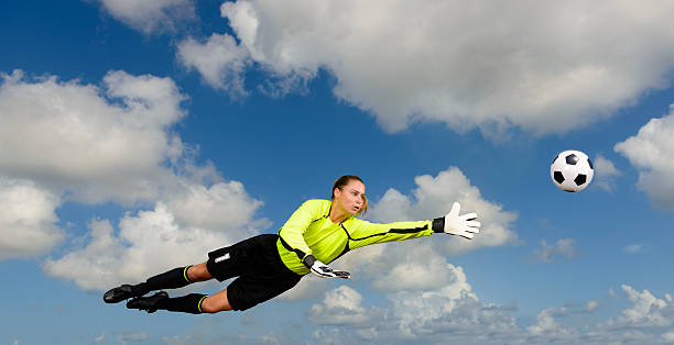 istock Female Goalkeeper In Action 477539499