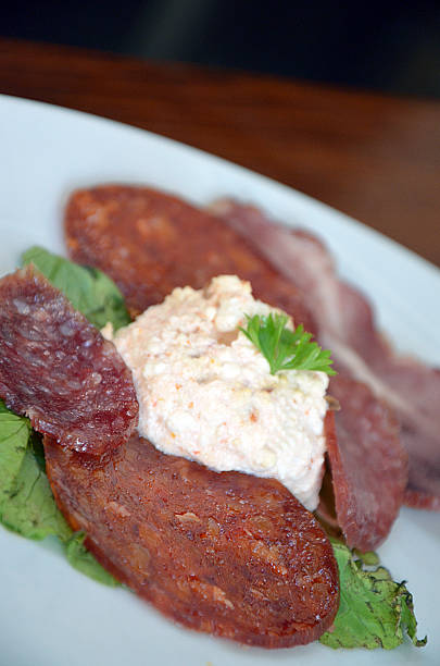 istock Meat delicatessen plate in a restaurant 477540032