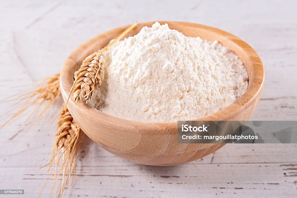 bowl of flour Flour Stock Photo