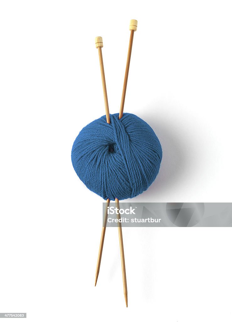 Blue ball of wool Knitting needle with wool isolated on a white background Knitting Needle Stock Photo