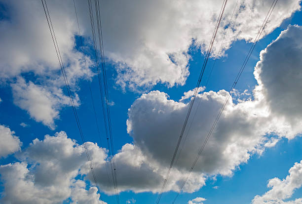 istock Electric power transmisson in a blue cloudy sky 477544818
