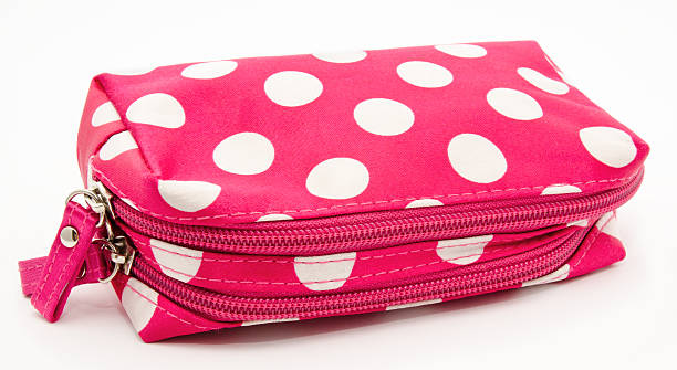 istock Pink cosmetic bag isolated on a white 477544981