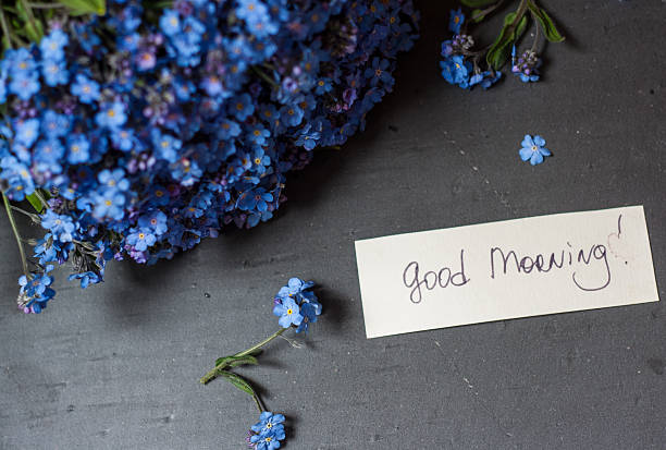 istock Blue flowers and good morning note 477545438