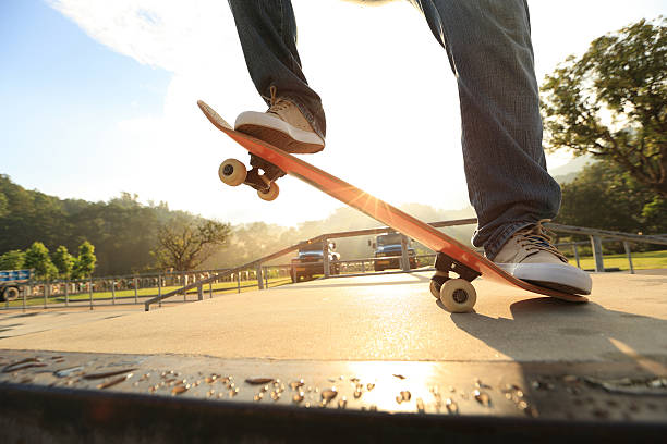 istock skateboarder legs skateboarding at skatepark ramp 477545666