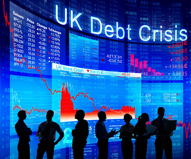 istock Business People Discussing About UK Debt Crisis 477546690