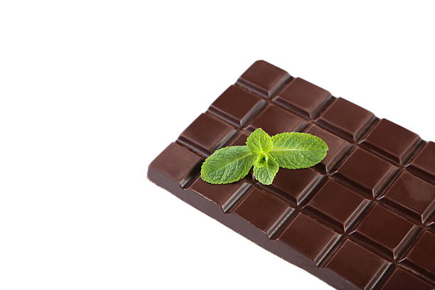 istock Fresh mint with chocolate bar isolated on a white 477546722