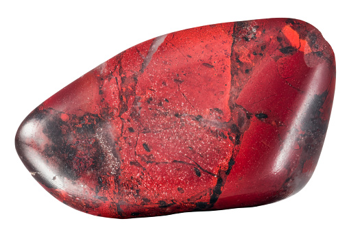 small pebble of red jasper macro isolated on white