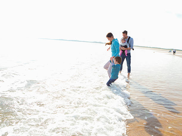 istock Family on the Beach 477547872