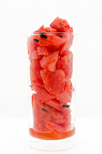istock Watermelon in glass isolated on white background 477547876
