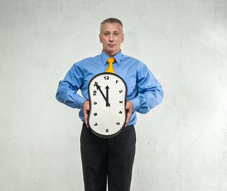 Compressed clock in the hands of man