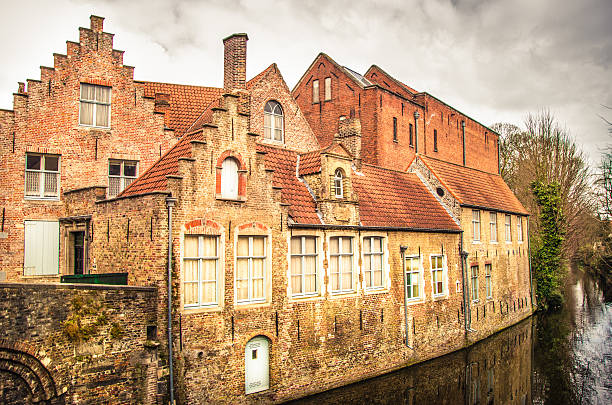 istock Bruges - Old houses on a canal 477548238