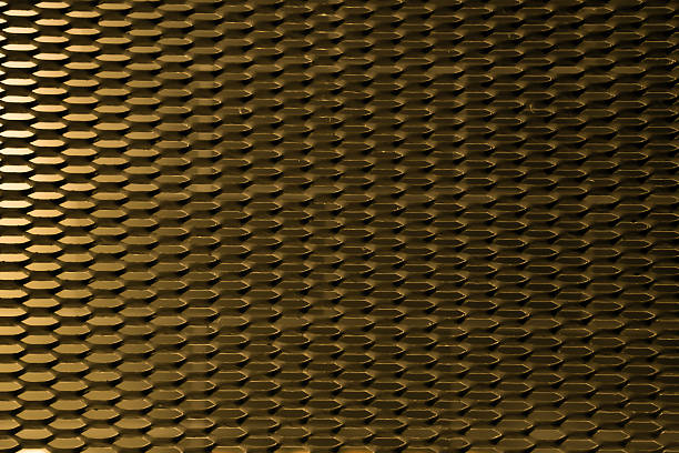 istock Texture of metalic mesh gold 477549352