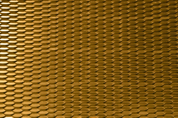 istock Texture of metalic mesh gold 477549356