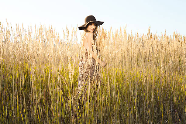 istock Beautiful young model in tallgrass meadow 477549638