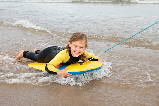 istock Girl Bodyboarding 477550158