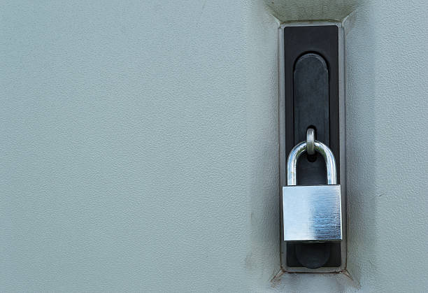 istock padlock locked on telephone exchange cabinet 477550446
