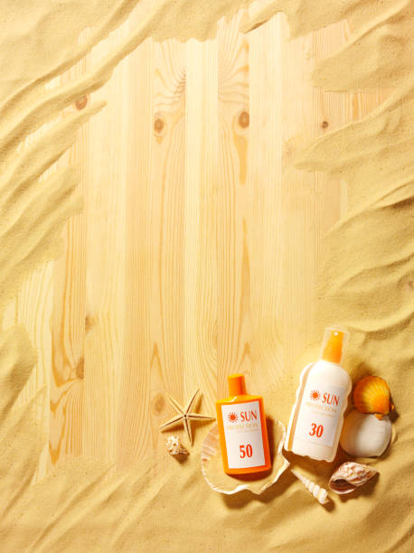 istock Sun Cream and Seashells in the Sand 477553333