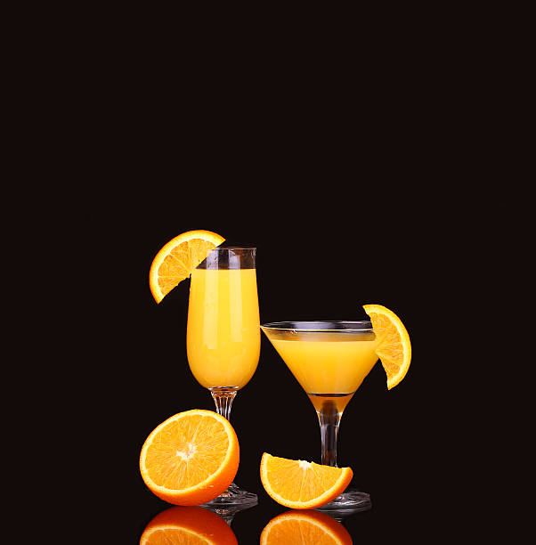 istock fresh organic orange juice and vodka in a tall glass 477555246