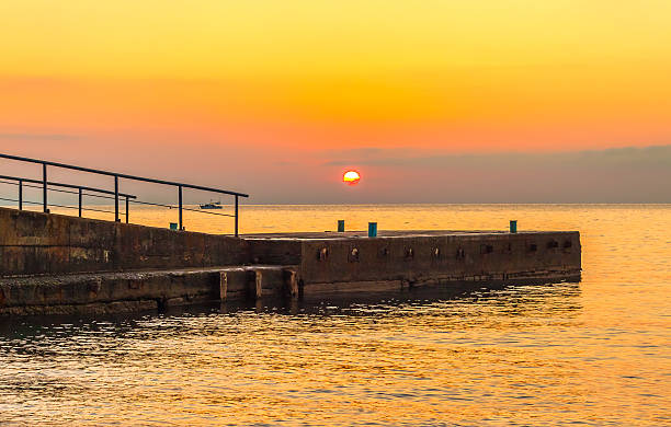 istock golden sunset on the sea 477555697