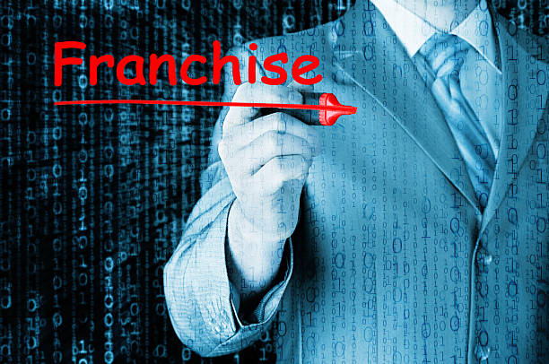 istock business man writing franchise 477556300