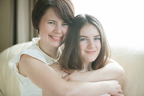 istock Mother and daughter happy embrace. 477556762