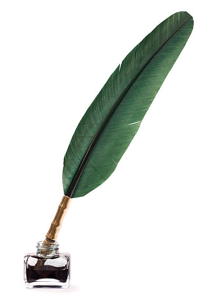 istock Quill pen in inkwell isolated 477557143