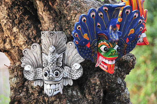 Sri Lankan traditional mask Sri Lankan traditional Fire Devil masks to sell at a store near the road. anuradhapura photos stock pictures, royalty-free photos & images
