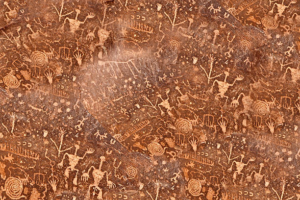 istock Ancient symbols, real texture in stone, USA 477557489