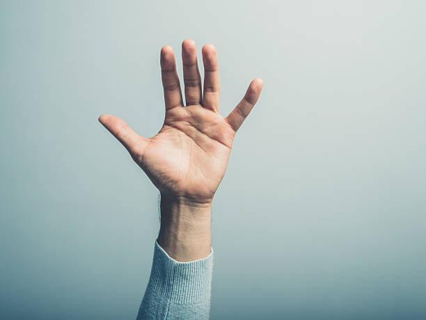 Male hand waving