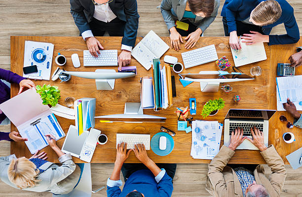 istock Group of Multiethnic Busy People Working in an Office 477562226