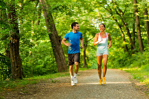 istock Young people running in nature 477562240